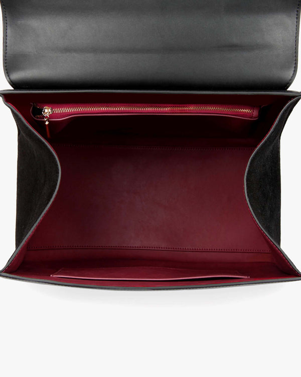 Sac ALEXIA Noir ouvert, vue intérieur avec doublure bordeaux, poche zippée et poche plaquée