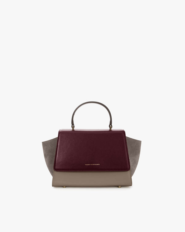 ALEXIA bag in Colourblock Stratum, front view, top handle, side wings and burgundy flap