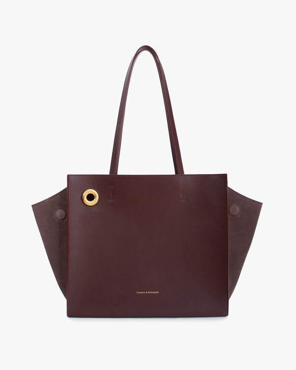 LEXI MM tote bag in aubergine, front view with shoulder straps, leather wings and tonal suede panels