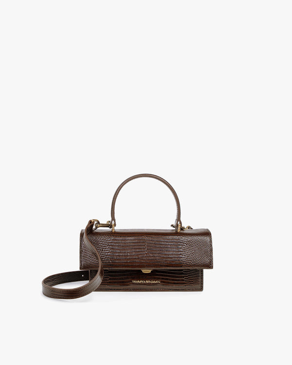 THEA MINI bag in brown embossed lizard, front view, closed flap, top handle and removable strap
