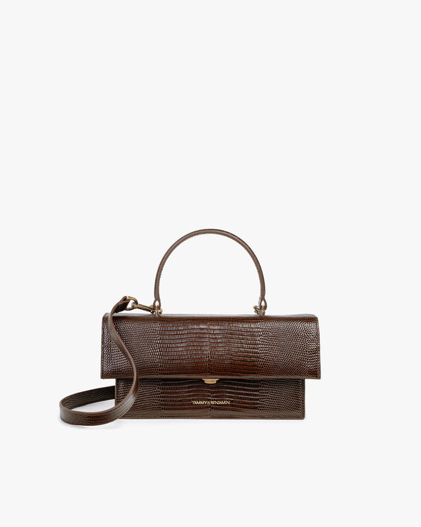 THEA bag in brown embossed lizard, front view, closed flap, rigid handle and adjustable leather strap