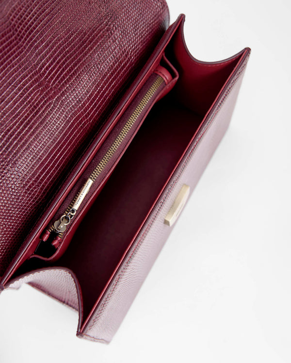 THEA bag in Bordeaux - Embossed Lizard, open interior view with zipped pocket and magnetic clasp