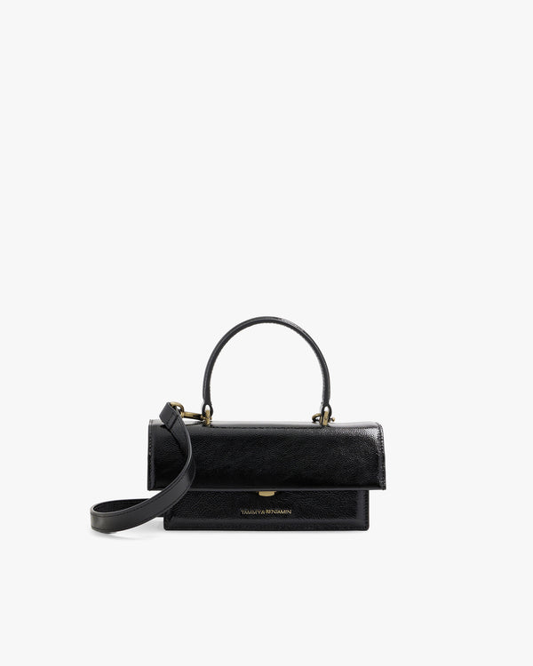 Sac THEA MINI noir naplak de face, posé, avec anse courte et bandoulière amovible détachée