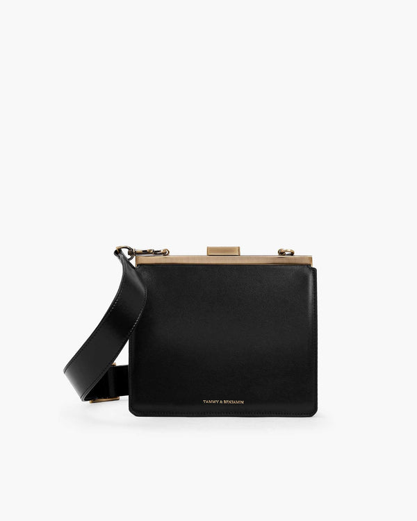 JEANNE bag in Black, front view with gold metal clasp and adjustable strap