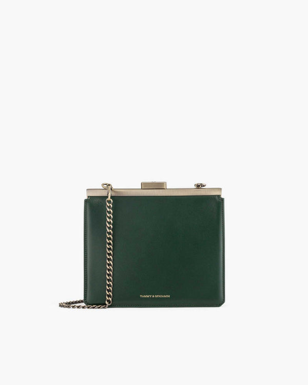 JEANNE bag in emerald green, front view with gold-tone clasp and removable chain strap